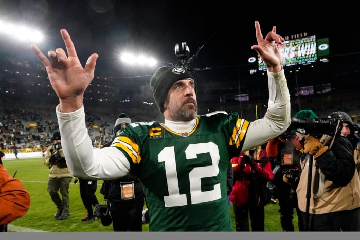 Green Bay Packers quarterback Aaron Rodgers (12) waves to fans as he leaves the field following an NFL football game against the Los Angeles Rams in Green Bay, Wis. Monday, Dec. 19, 2022. The Packers defeated the Rams 24-12.